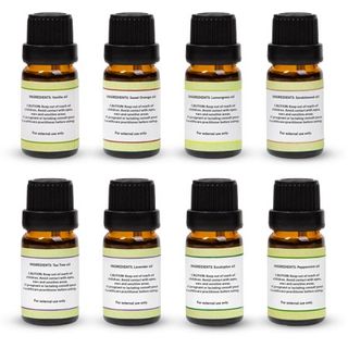 8 small amber glass bottles of essential oils