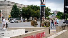 Soldiers relax near Smithsonian museums during Army's 250th anniversary commemoration