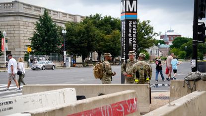 Soldiers relax near Smithsonian museums during Army's 250th anniversary commemoration