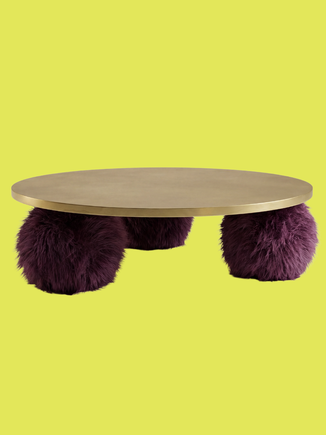 A brassy coffee table with furry purple legs