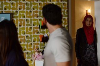 Kush and Stacey spring apart in EastEnders as Shabnam walks in (BBC)