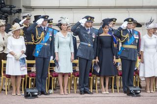Duchess Camilla of Cornwall, Prince William, Duke of Cambridge, Catherine, Duchess of Cambridge, Prince Harry, Duke of Sussex, Meghan, Duchess of Sussex, Prince Andrew, Duke of York, and Sophie, Countess of Wessex, attend a ceremony to present a new Queen's Colour to the Royal Air Force.