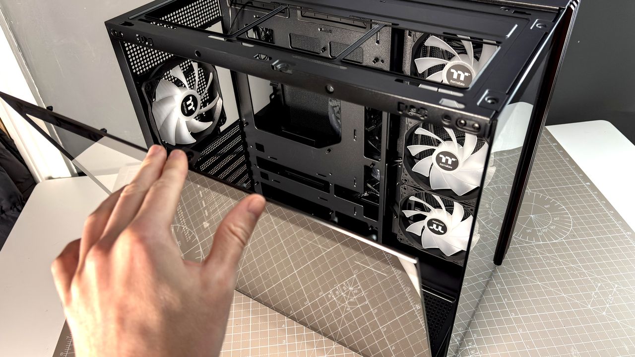 The Thermaltake View 380 WS ARGB on a desk with various components fitted.