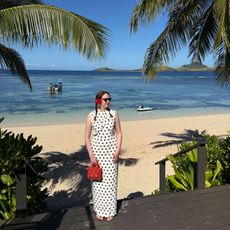 Fashion editor Erin Fitzpatrick wears a polka dot dress in Fiji 