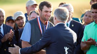 Scottie Scheffler is awarded the low amateur medal at the 2017 US Open