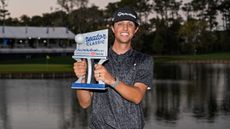 Grant Horvat holds the Creator Classic trophy