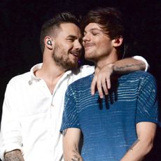 Liam Payne and Louis Tomlinson perform onstage for 102.7 KIIS FM