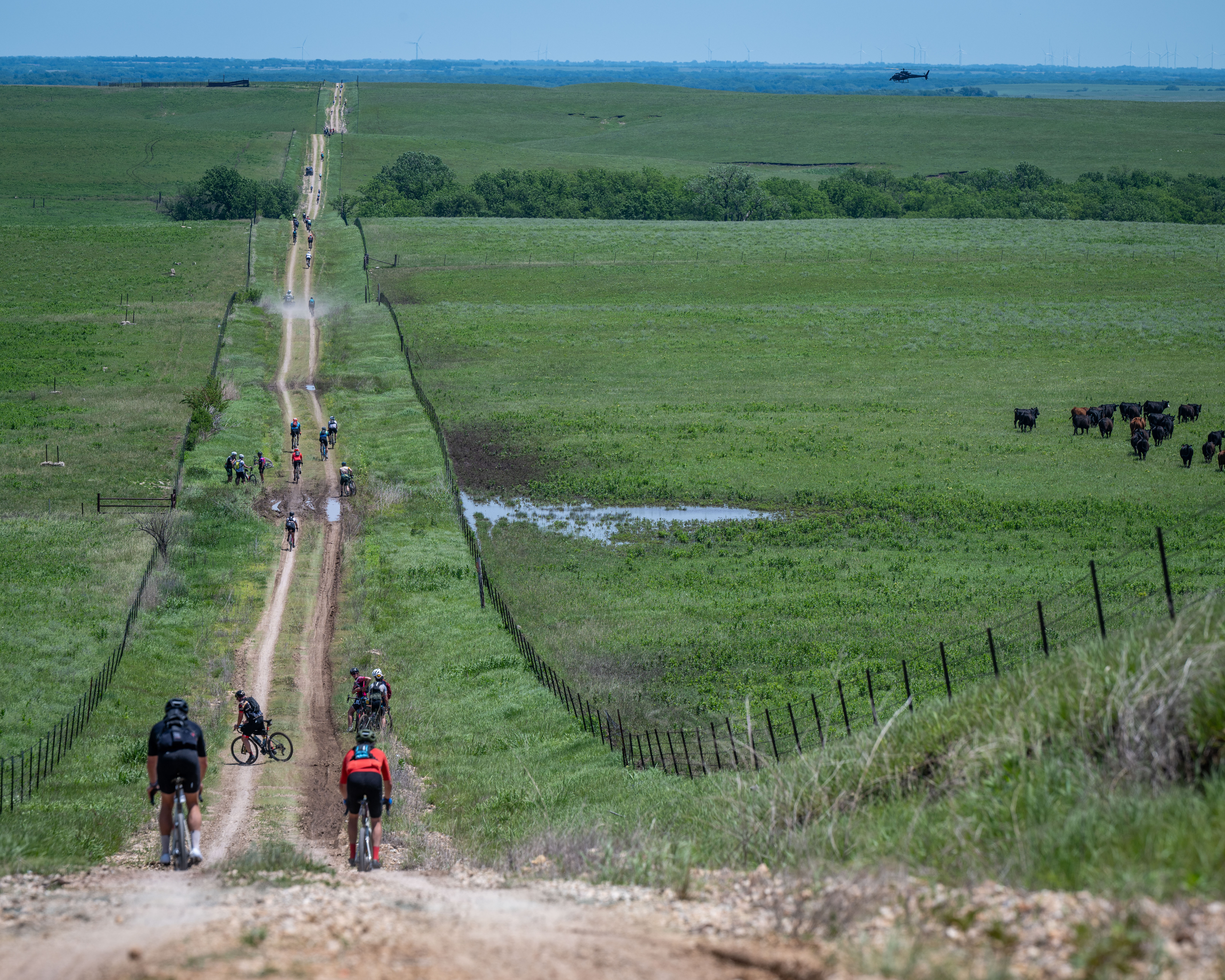 Riders on Unbound Gravel 200 route encounter long stretches of double-track dirt roads and sections of mud