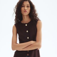 woman wearing brown waistcoat