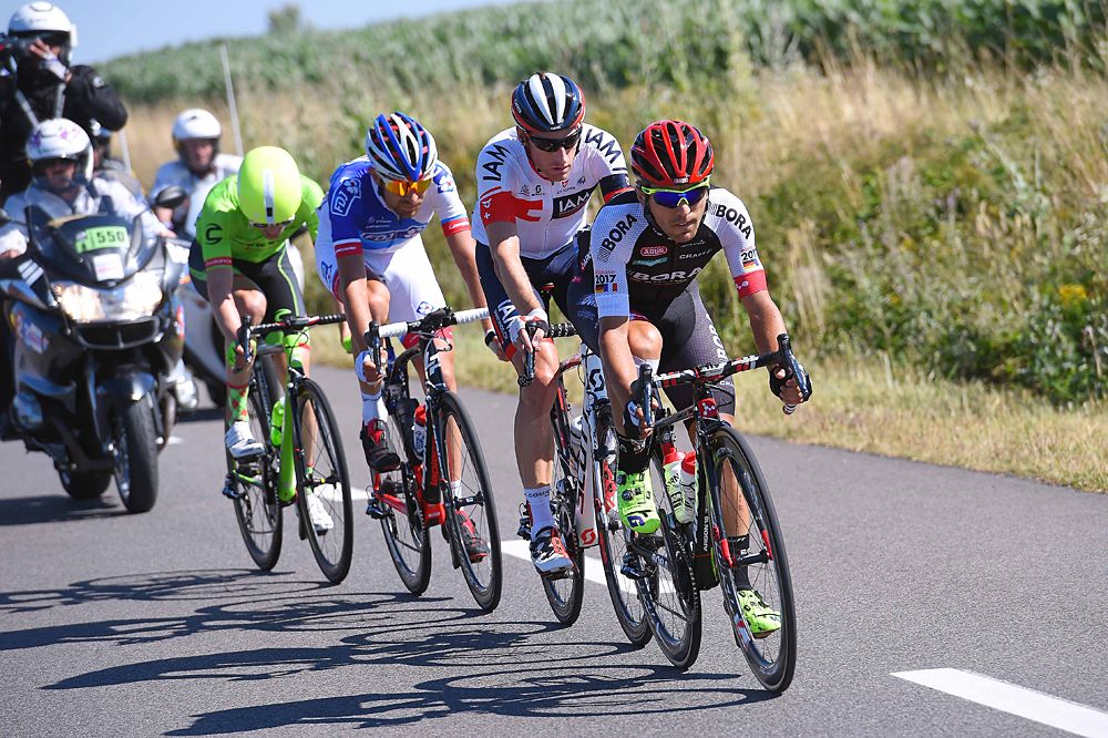 Cesar Benedetti (Bora Argon 18) leads the four-man breakaway
