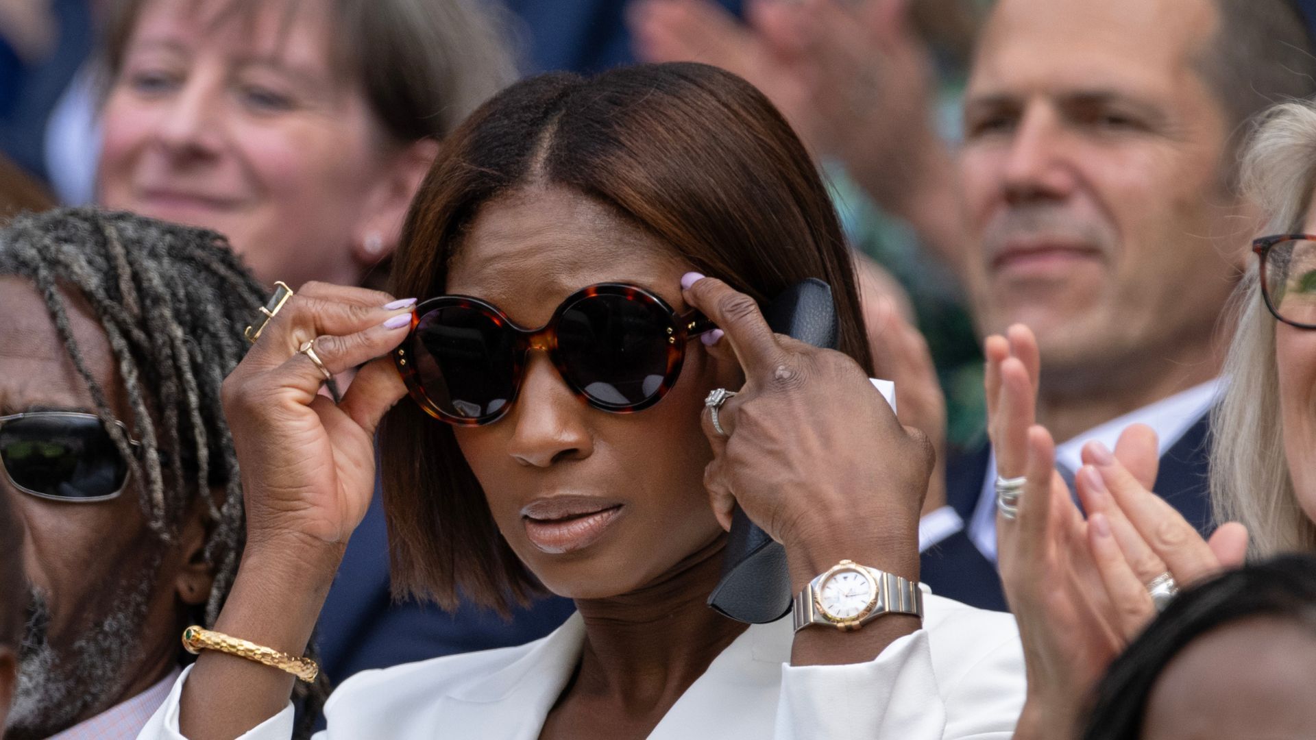 denise lewis wearing sunglasses