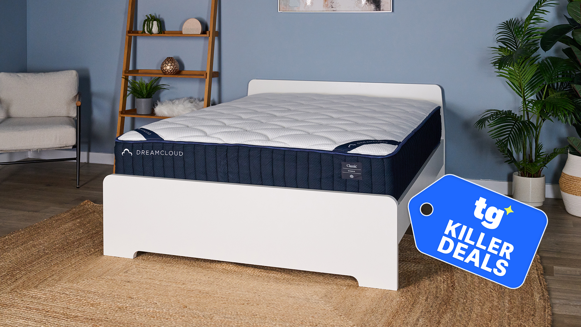 A DreamCloud Classic Hybrid Mattress on a bed frame in our sleep studio, a Tom's Guide killer deal graphic in the bottom right corner