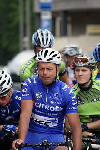 Veteran Jan Kirsipuu waits for the start of the road race.