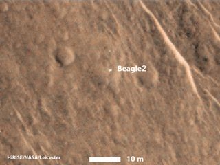 Officials think that the Beagle 2 lander (seen as a bright spot here) partially deployed its solar panels when it reached the surface of Mars in 2003. European Space Agency officials lost contact with the lander after it was released down to the surface o