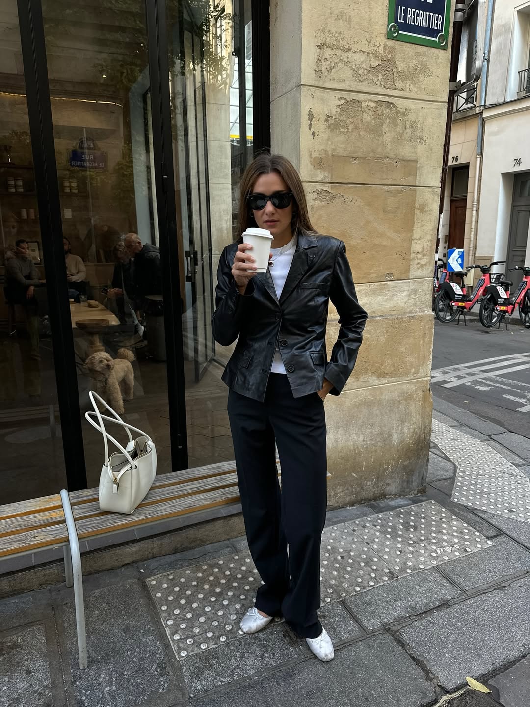 Adenorah wearing black trousers