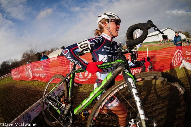 Amanda Miller (Tibco) sprinting over some barriers in third place