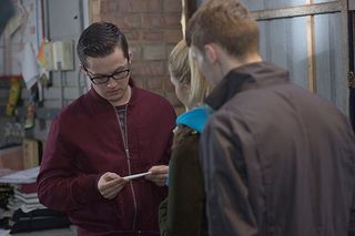 WARNING: Embargoed for publication until 00:00:01 on 09/02/2016 - Programme Name: Eastenders - TX: 15/02/2016 - Episode: 5229 (No. n/a) - Picture Shows: Abi shows Ben proof. Ben Mitchell (HARRY REID), Abi Branning (LORNA FITZGERALD), Jay Mitchell (JAMIE BORTHWICK) - (C) BBC - Photographer: Jack Barnes