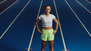 Anya Culling standing on a running track