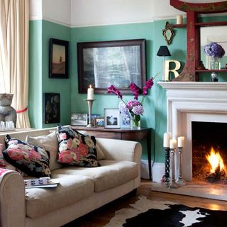 living room with fireplace and photoframe on wall