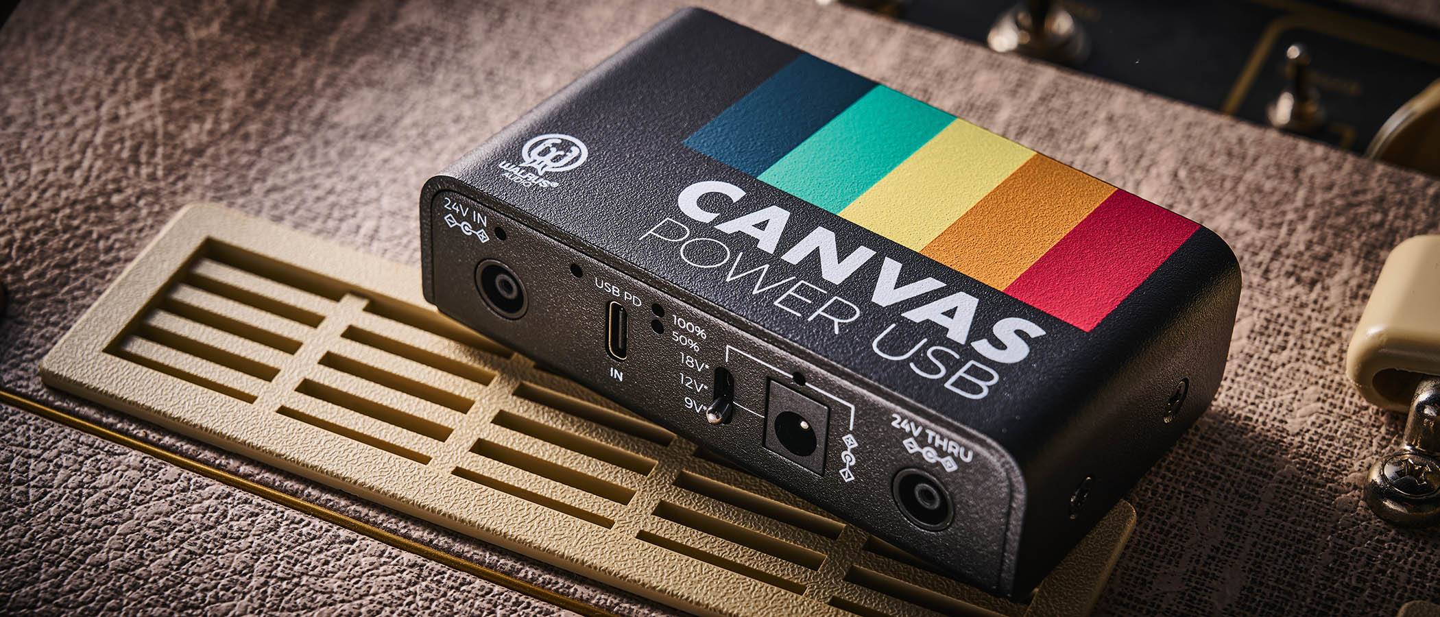 Walrus Audio Canvas Power USB: the latest in the pedal brand's pedalboard power supplies lineup is photographed against a fawn-colored Vox tube amp
