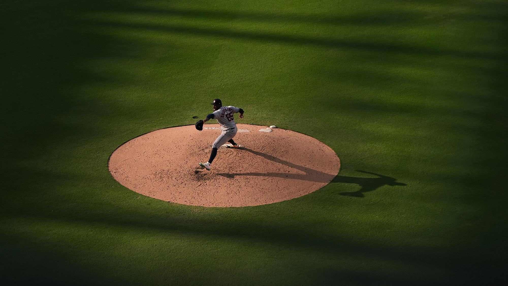 Houston Astros pitcher Enyel De Los Santos throws a pitch against the San Diego Padres during the sixth inning of a baseball game at Petco Park in San Diego, California