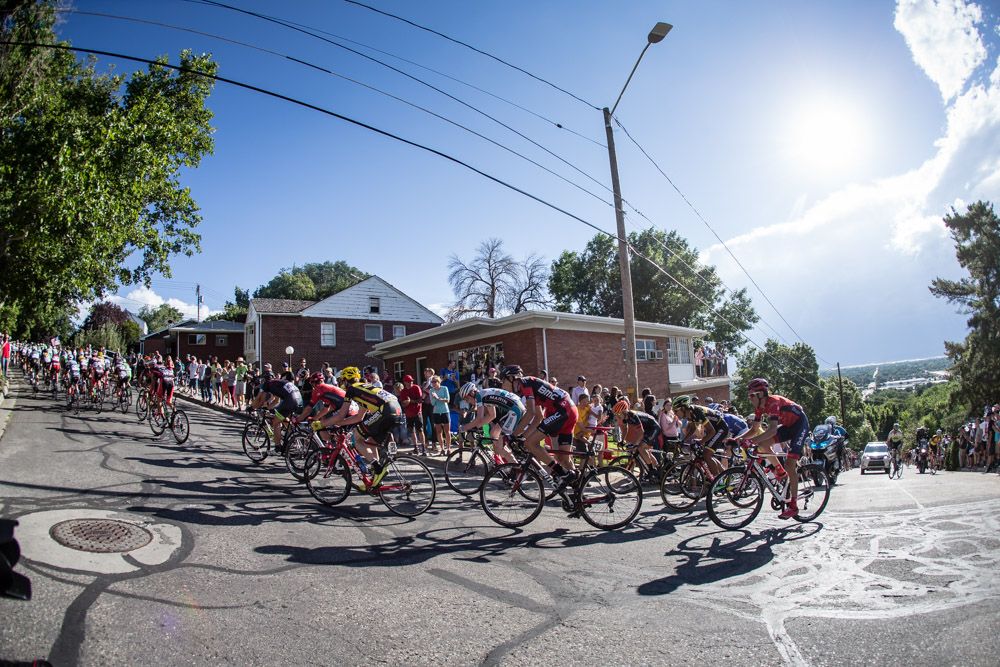 Riders make the steep turn part way up the climb