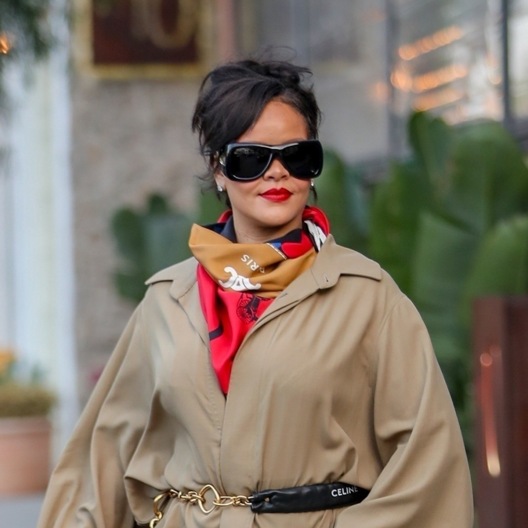 Rihanna wears two totally different outfits in one day, including a head-to-toe black look and a duster coat