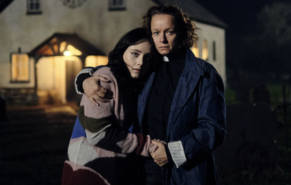 Samantha Morton and Ruby Stokes embrace and look scared in The Burning Girls