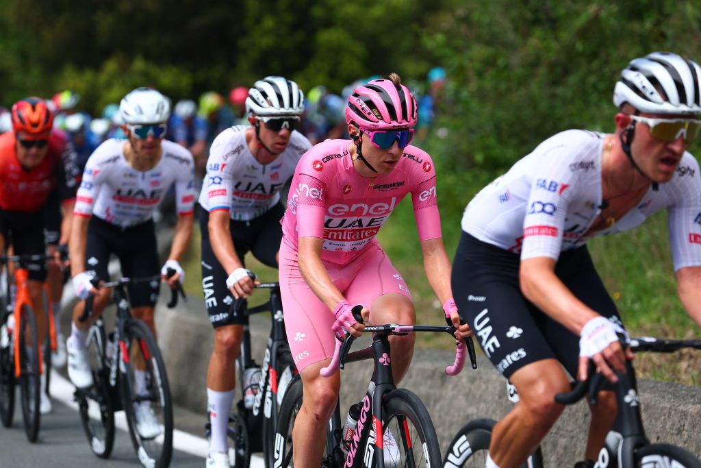 Pink Jersey, Team UAE's Slovenian rider Tadej Pogacar, rides in the pack near Sestri Levante during the 5th stage of the 107th Giro d'Italia cycling race, 178 km between Genova and Lucca, on May 8, 2024. (Photo by Luca Bettini / AFP)