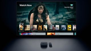 Apple TV -mediatoistin television edessä