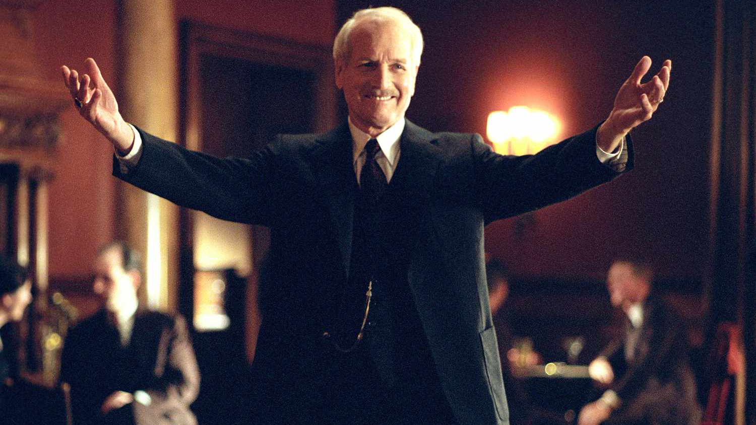 Paul Newman smiling with open arms