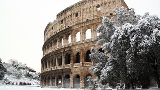The Coliseum covered by snow, a really rare event in Rome.