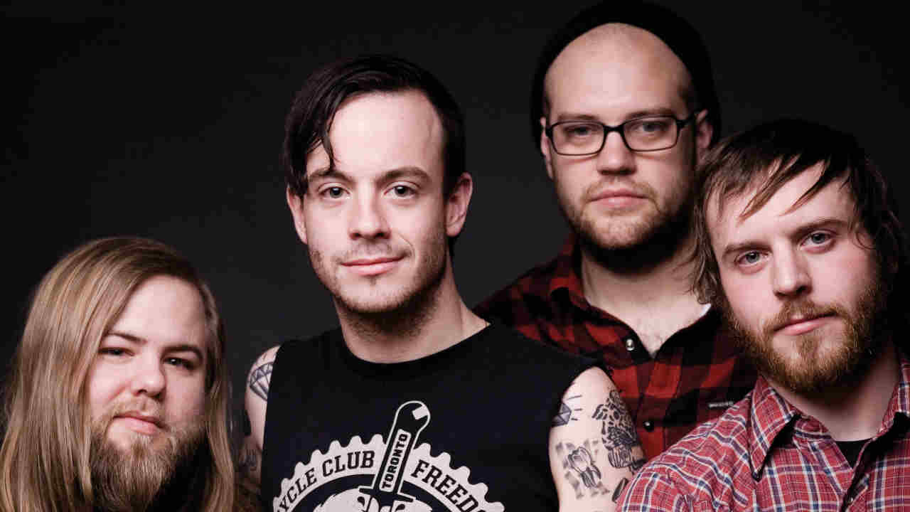Cancer Bats posing for a photograph