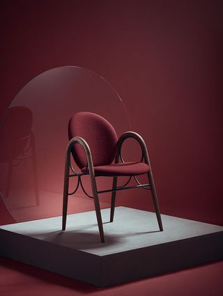 Red chair with wooden frame