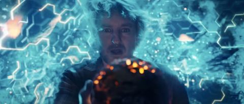 Owen Wilson holds a powerful orb in the middle of a great disturbance in Secret Headquarters.
