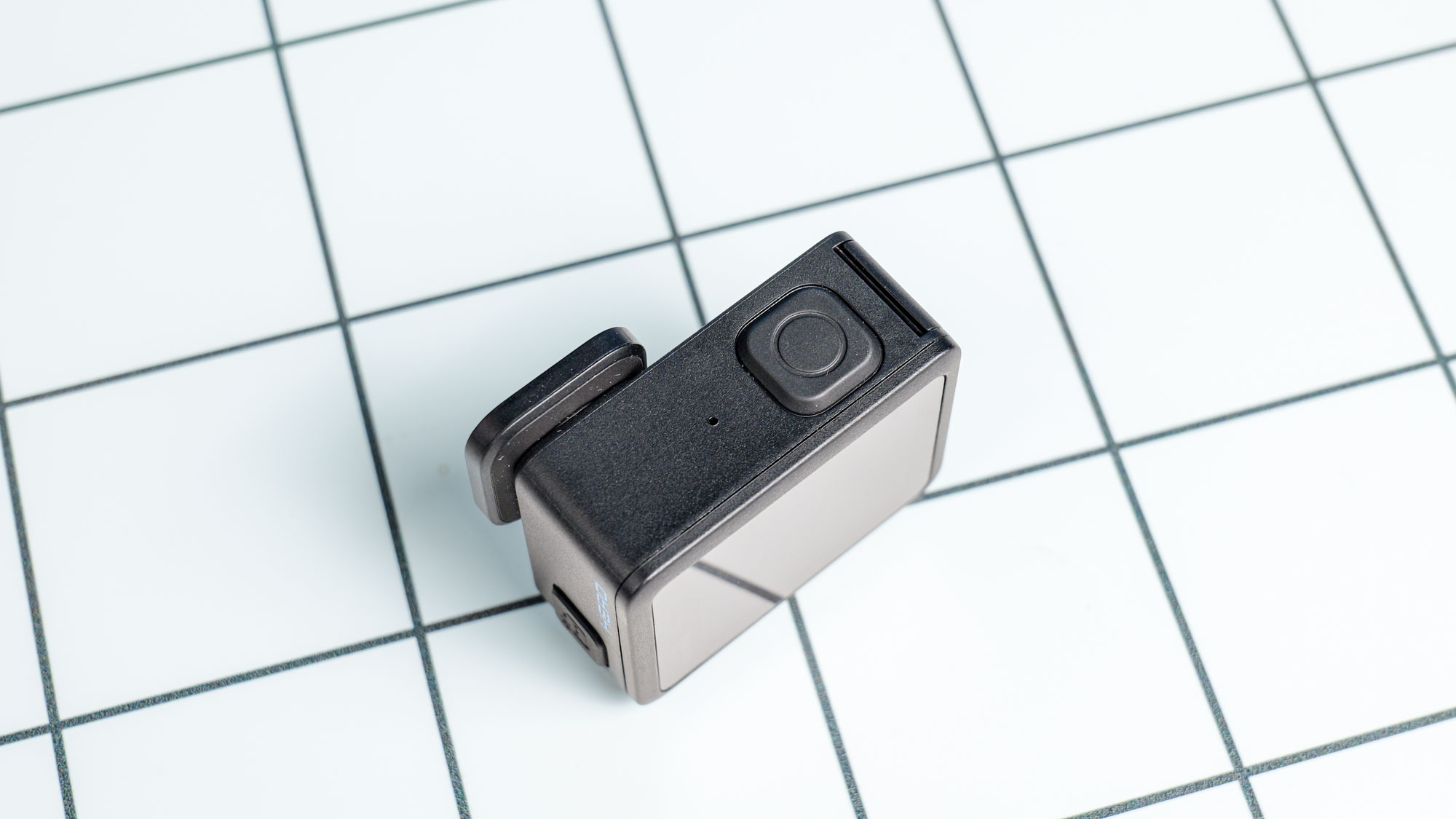 The GoPro Hero (2024) on a white surface