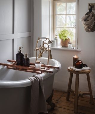 warm, inviting bathroom with candle