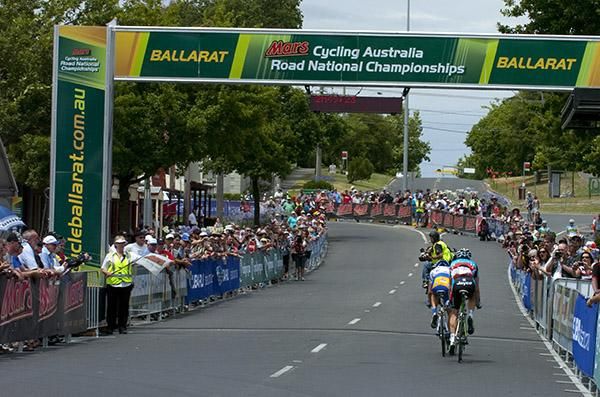 Eric Sheppard and Rohan Dennis enter the final lap of the 122.4km road race with daylight to the peloton