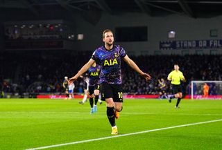 Tottenham Hotspur’s Harry Kane celebrates scoring their side’s second goal of the game the game during the Premier League match at the AMEX Stadium, Brighton. Picture date: Wednesday March 16, 2022