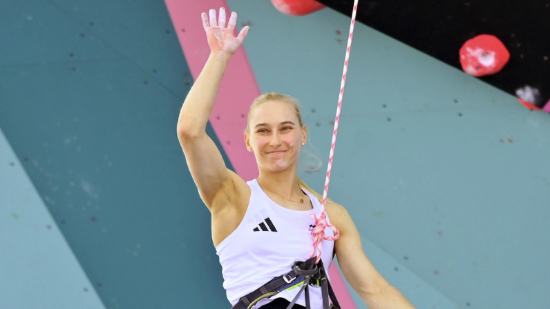  Janja Garnbret of Slovenia waves to the crowd ahead of the women&#039;s Sport Climbing Combined final at Olympics 2024