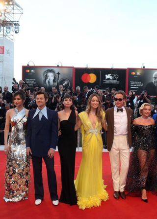 Gemma Chan, Harry Styles, Sydney Chandler, director Olivia Wilde, Chris Pine and Florence Pugh attend the "Don't Worry Darling" red carpet at the 79th Venice International Film Festival