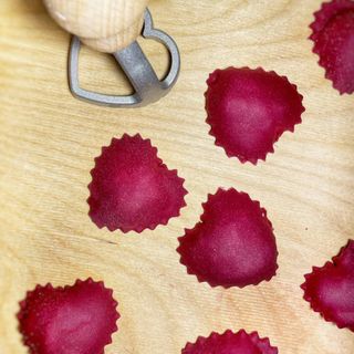 Pasta Evangelists Valentine's Day Amore Pasta Making Kit – pink ravioli on side with cutter