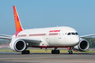 An image of one of Air India's planes on the runway