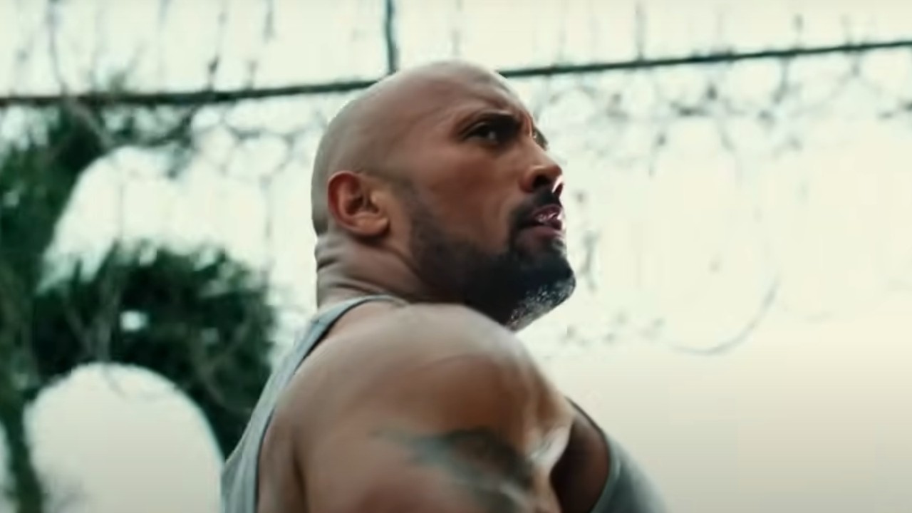 Dwayne Johnson looking over his shoulder in jail in Pain &amp;amp; Gain