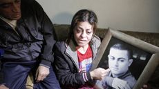 The parents of Arab-Israeli Mohammed Musallam at the family's home in the East Jerusalem