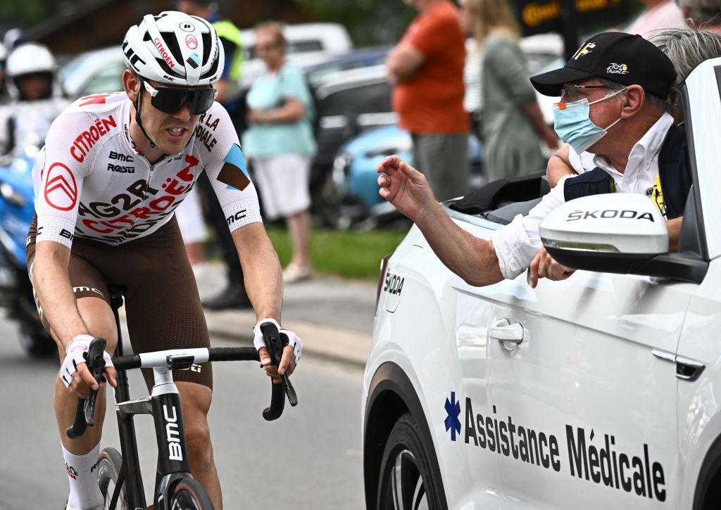 AG2R Citroen Teams Australian rider Ben OConnor speaks with race medics as he cycles during the 9th stage of the 109th edition of the of the Tour de France cycling race 1929 km between Aigle in Switzerland and Chatel Les Portes du Soleil in the French Alps on July 10 2022 Photo by AnneChristine POUJOULAT AFP Photo by ANNECHRISTINE POUJOULATAFP via Getty Images