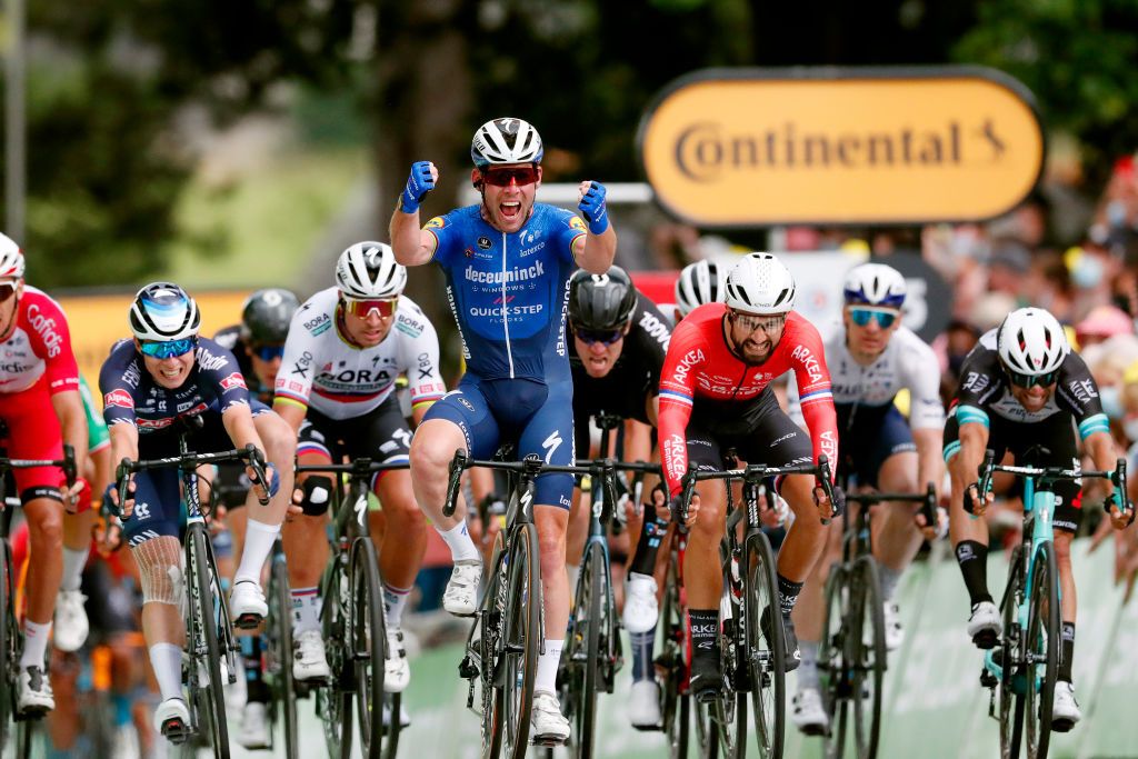 FOUGERES FRANCE JUNE 29 Jasper Philipsen of Belgium and Team AlpecinFenix Mark Cavendish of The United Kingdom and Team Deceuninck QuickStep stage winner celebrates at arrival Peter Sagan of Slovakia and Team BORA Hansgrohe Nacer Bouhanni of France and Team Arka Samsic Michael Matthews of Australia and Team BikeExchange sprint at arrival during the 108th Tour de France 2021 Stage 4 a 1504km stage from Redon to Fougres LeTour TDF2021 on June 29 2021 in Fougeres France Photo by Guillaume Horcajuelo PoolGetty Images