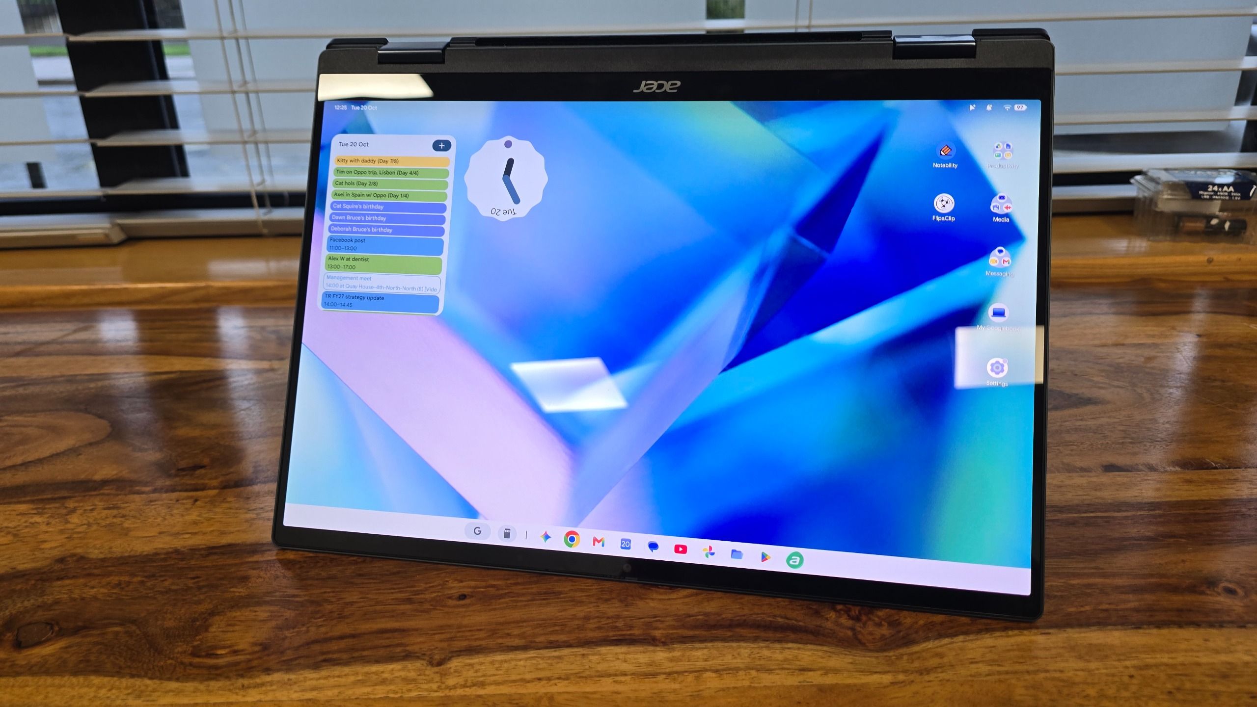 Acer Googlebook 14 on a wooden desk in an office