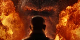 Kong faces down Samuel L. Jackson in the fire, in Kong: Skull Island.