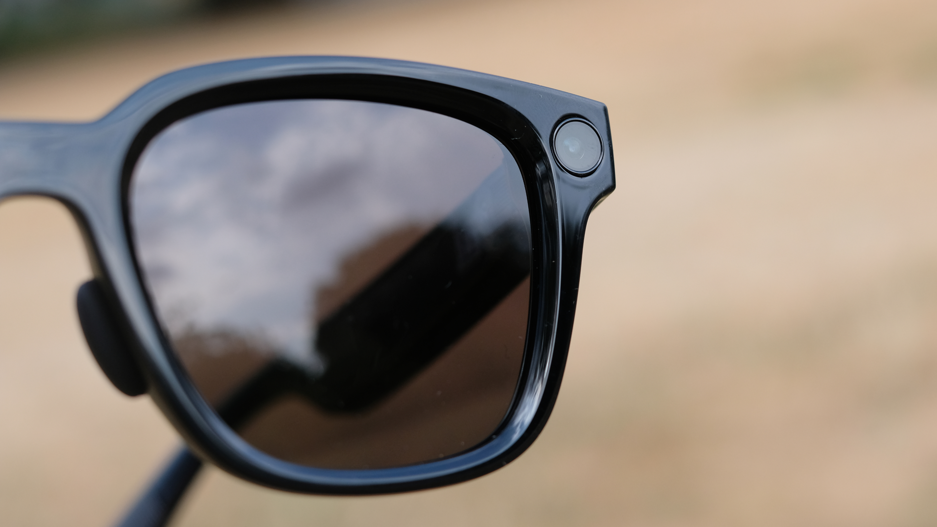 Hands-on photograph of Rokid AI Glasses Style close up of camera module